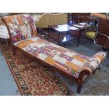 DAYBED, Indian teak framed with multicoloured patchwork upholstery on turned supports, 220cm L.