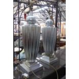CHELSOM LAMPS, a pair, silvered finish, 62cm H.