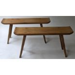 BENCHES, a pair, 1970's Swedish pine, each with upturned ends and splay tapering chamfered supports,
