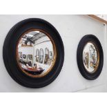 CONVEX BUTLER MIRRORS, a pair, in the regency style.