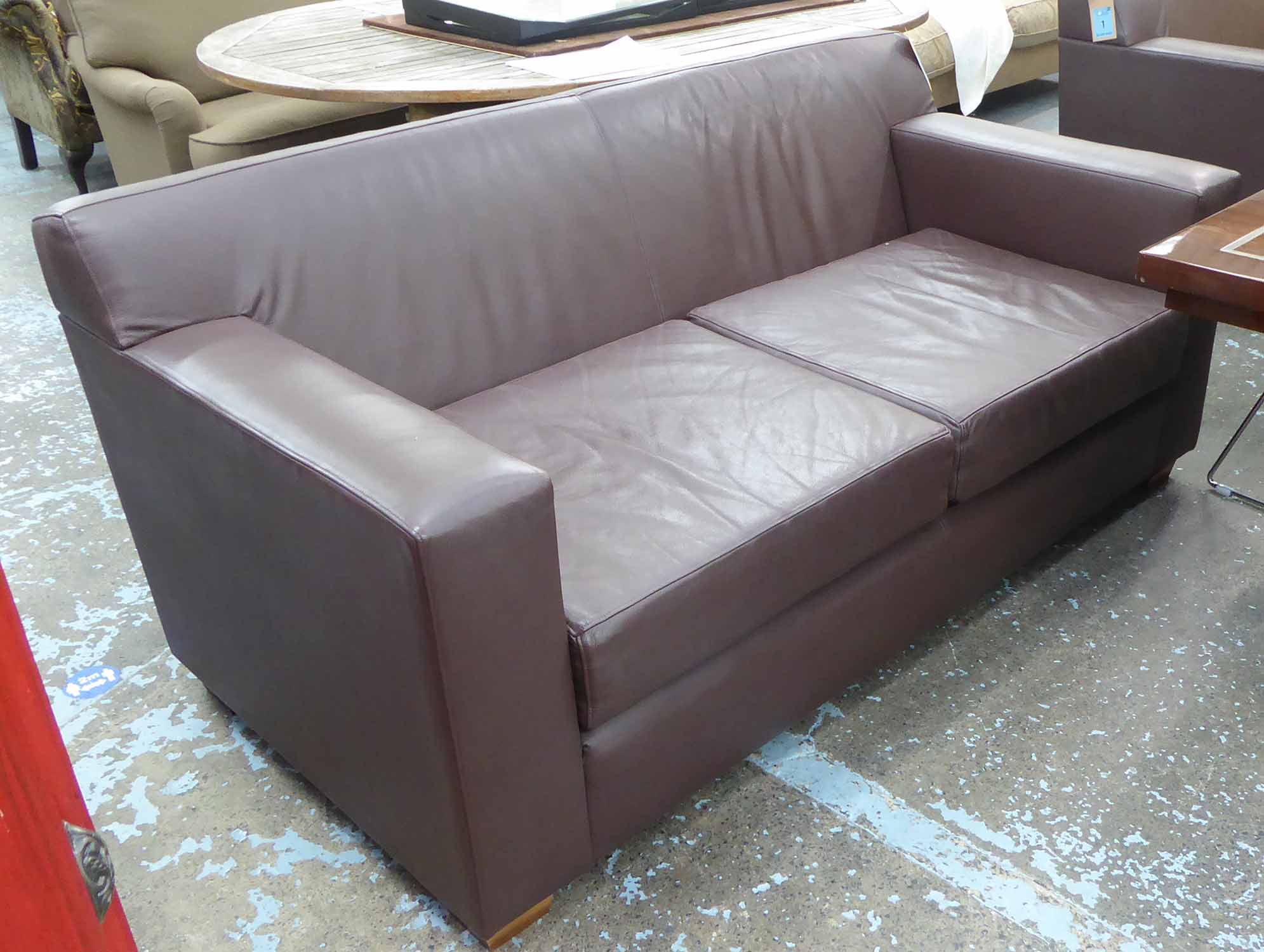 DE LA ESPADA SOFA, raw umber finish, on block supports, 170cm W.