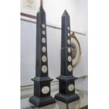 OBELISKS, a pair, with faux intaglio detail, ebonised finish, 69cm H.