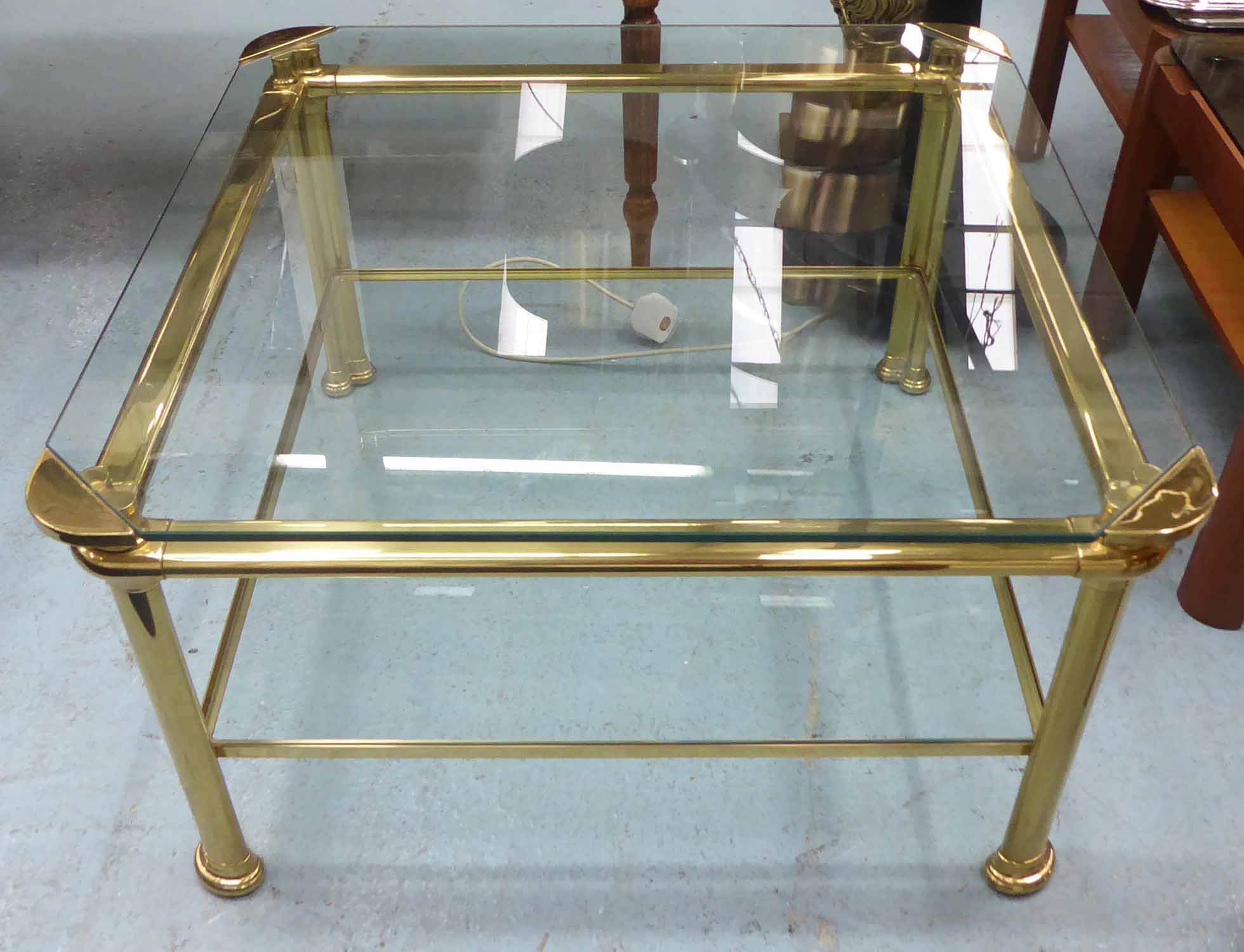 MARA COCKTAIL TABLE, vintage 1970s, signed on corner, gilt metal and glass, 67cm x 67cm x 38cm.