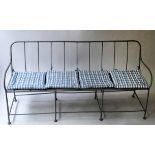 GARDEN BENCH, early 20th century French wrought iron and grey painted with slatted back,