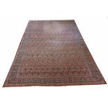 FINE PART SILK QUM CARPET, 325cm x 217cm, all over boteh design within corresponding borders.