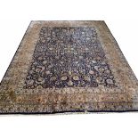 KASHAN DESIGN CARPET, 300cm x 240cm, all over palmette and vine field within corresponding borders.