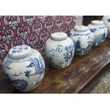 CHINESE GINGER JARS, four, lidded, blue and white painted floral detail, each 24cm H.