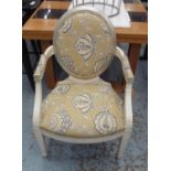 ANDREW MARTIN OPEN ARMCHAIR, distressed framed with later added foliate patterned upholstery,