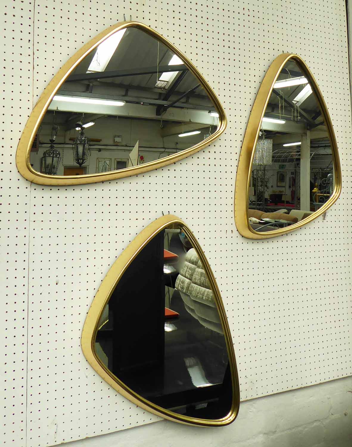 WALL MIRRORS, a set of three, 1970's Italian style, 58cm w.