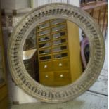 WALL MIRROR, Indian grey painted with circular carved pendant frame, 120cm D.