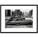 ELI REED 'Kids on the Car - a Long Walk Home', Bansky flags appropriated image,