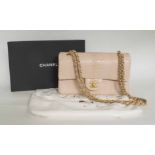 CHANEL CLASSIC FLAP BAG LIGHT PINK PYTHON, with interwoven brass and leather chain,