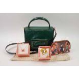 ORLA KIELY HANDBAG, patent green leather with snap front closure,