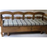 SWEDISH HALL SETTLE, vintage Swedish pine with scroll arms and feet,