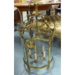 HALL LANTERN, of substantial proportions, the decorative brass frame with shaped glass panel,