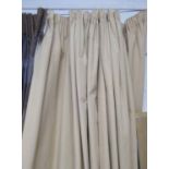 CURTAINS, a pair, beige patterned fabric, lined 92cm gathered by 247cm drop.