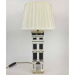 FORNASETTI TABLE LAMP, ceramic with lithographic transfer print and brass fittings, 57.