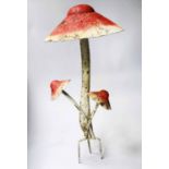 MUSHROOM, 1950's painted tin with three sprung mushroom heads, 90cm H.