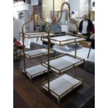 ETAGERES, a pair, 1960's French style, gilt metal with marble inserts, 86cm H.