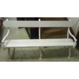 GARDEN BENCH, with a wooden back rail and seat on white painted cast iron supports,