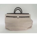 ASPREY STEAMER COLLECTION WEEKEND BAG, striped canvas and leather with silver tone hardware,