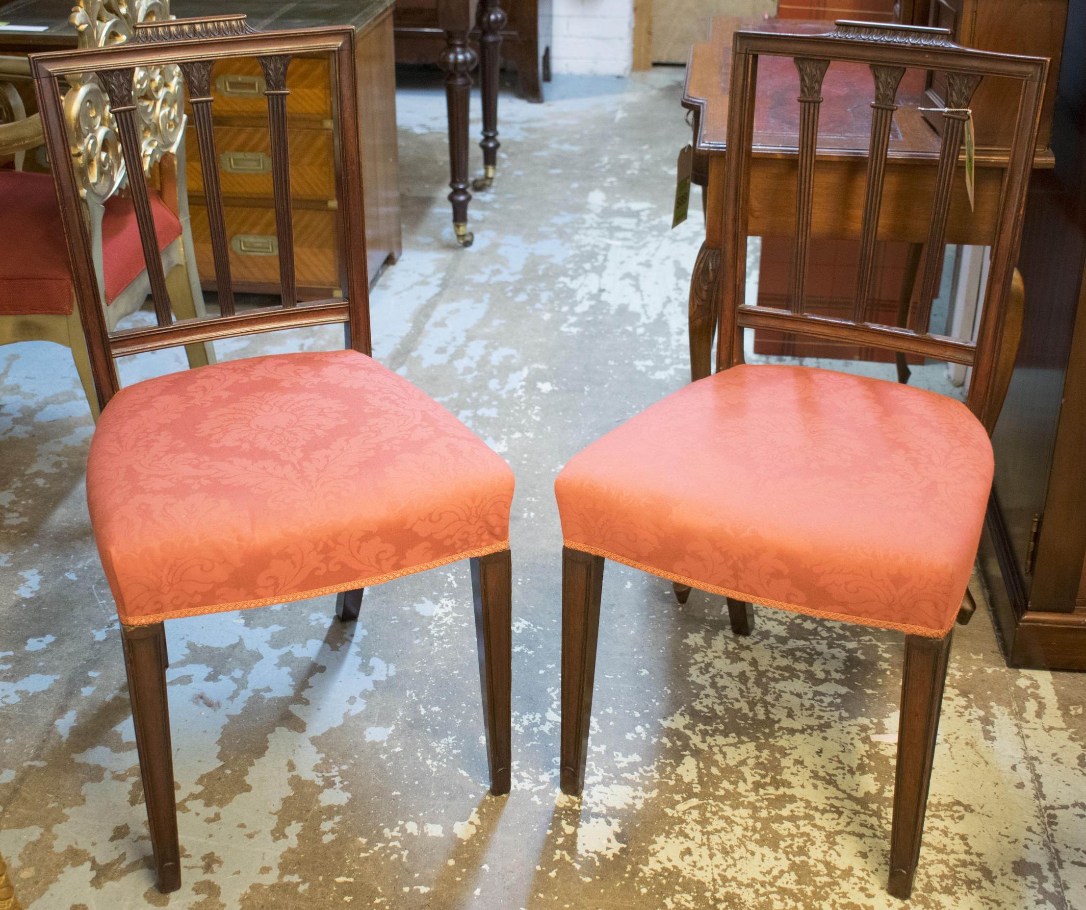 DINING CHAIRS, a set of six, George III mahogany with reeded and leaf carved, circa 1790,