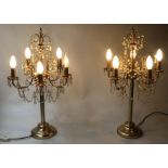 TABLE CHANDELIERS, Georgian style gilt metal each with five branches and lustre swags, 76cm H.