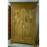 ARMOIRE, mid 19th century Continental cherrywood with two doors enclosing a shelf and hanging rail,