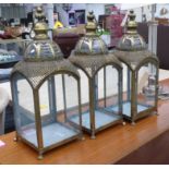 LANTERNS, a set of three, French Moroccan style, gilt finish, 57cm H.