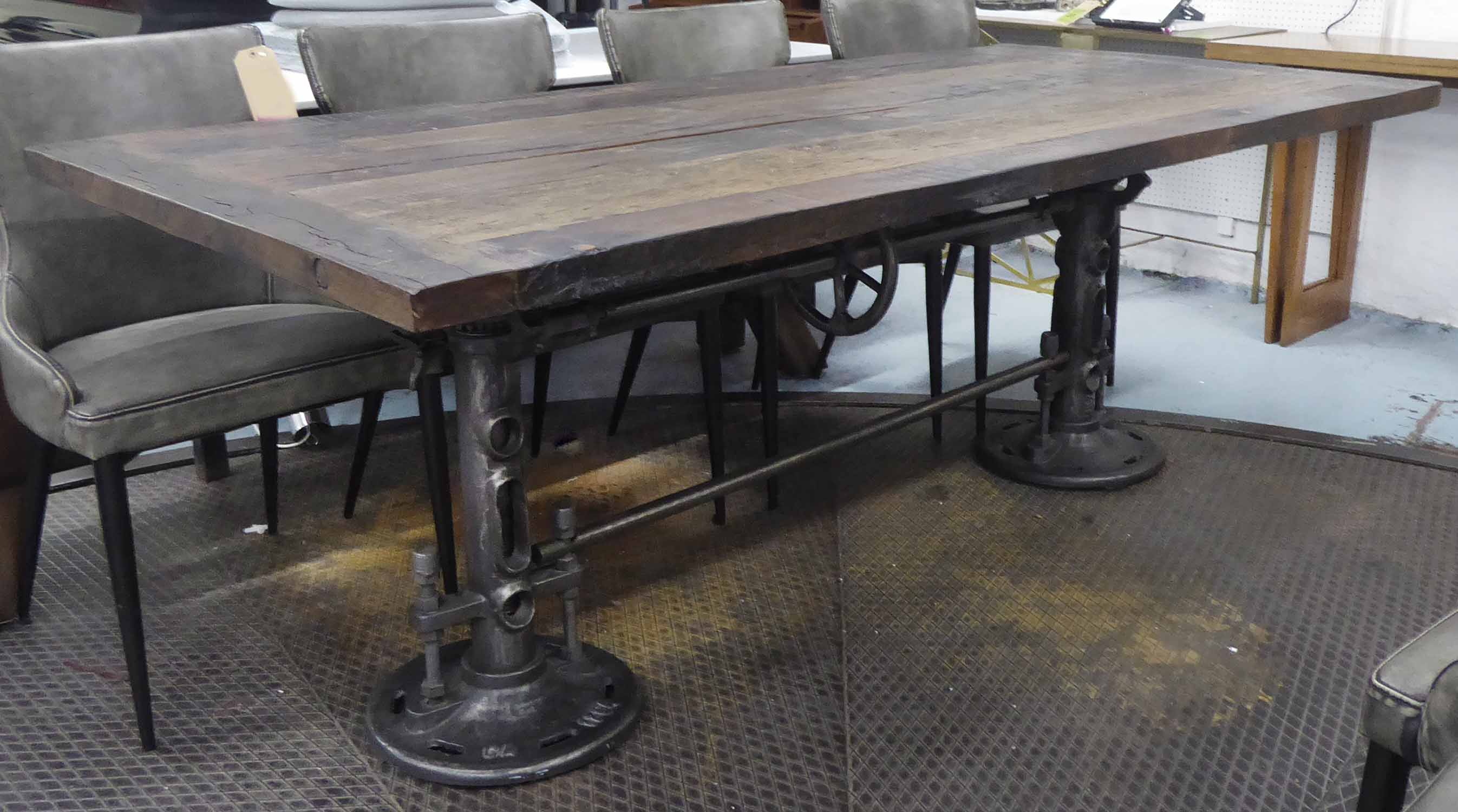 INDUSTRIAL STYLE DINING TABLE, with a rectangular reclaimed wooden top, 210cm L x 77cm H x 100cm D.