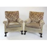 ARMCHAIRS, a pair, (en suite with the previous lot), 83cm W x 91cm H.