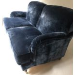 HOWARD STYLE SOFA, blue velvet upholstered and turned front supports on castors, 180cm W.