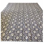 TIM PAGE IKAT DESIGN CARPET, 400cm x 305cm.