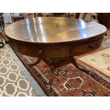 DRUM TABLE, Regency mahogany with circular crossbanded top above four real and four dummy drawers,