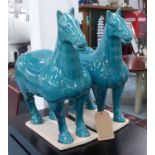 TANG STYLE HORSES, a pair, aqua blue glaze, 51cm H.