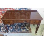 WRITING TABLE, Victorian mahogany with three drawers on brass castors, 78cm H x 120cm x 58cm.