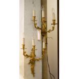 WALL SCONCES, a pair, gilt metal, 61cm H x 37cm.