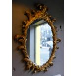 WALL MIRROR, George III style, giltwood with palm frond frame, 100cm x 75cm.