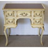 KNEEHOLE DESK, Louis XV taste cream and gilt with brown leather top above five drawers,
