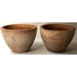 PLANTERS, a pair, vintage handmade terracotta of conical form with ring turnings,