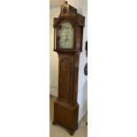 LONGCASE CLOCK, George III oak, with eight day movement and painted face inscribed 'Geo Travis,