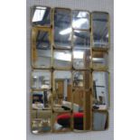 WALL MIRROR, 1960's French style segmented design, antiqued plate, 109cm x 72.5cm.