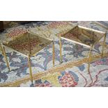LOW TABLES, a pair, brass with square tinted glass tops, 43cm H x 43cm.