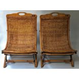 VERANDAH CHAIRS, a pair, early 20th century French bamboo, cane and fruitwood of slipper form,