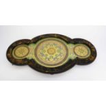 TRAY, Victorian gilt decorated papier mache and foiled paper backed glazed stand on bun feet,