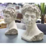 BUSTS OF DAVID PLANTERS, a pair, faux stone, 46cm H.