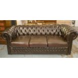 CHESTERFIELD SOFA, buttoned dark brown leather with three seat cushions, 205cm W.