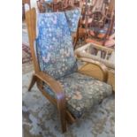 WINGBACK ARMCHAIR, mid 20th century with bentwood arms and vintage floral upholstery,