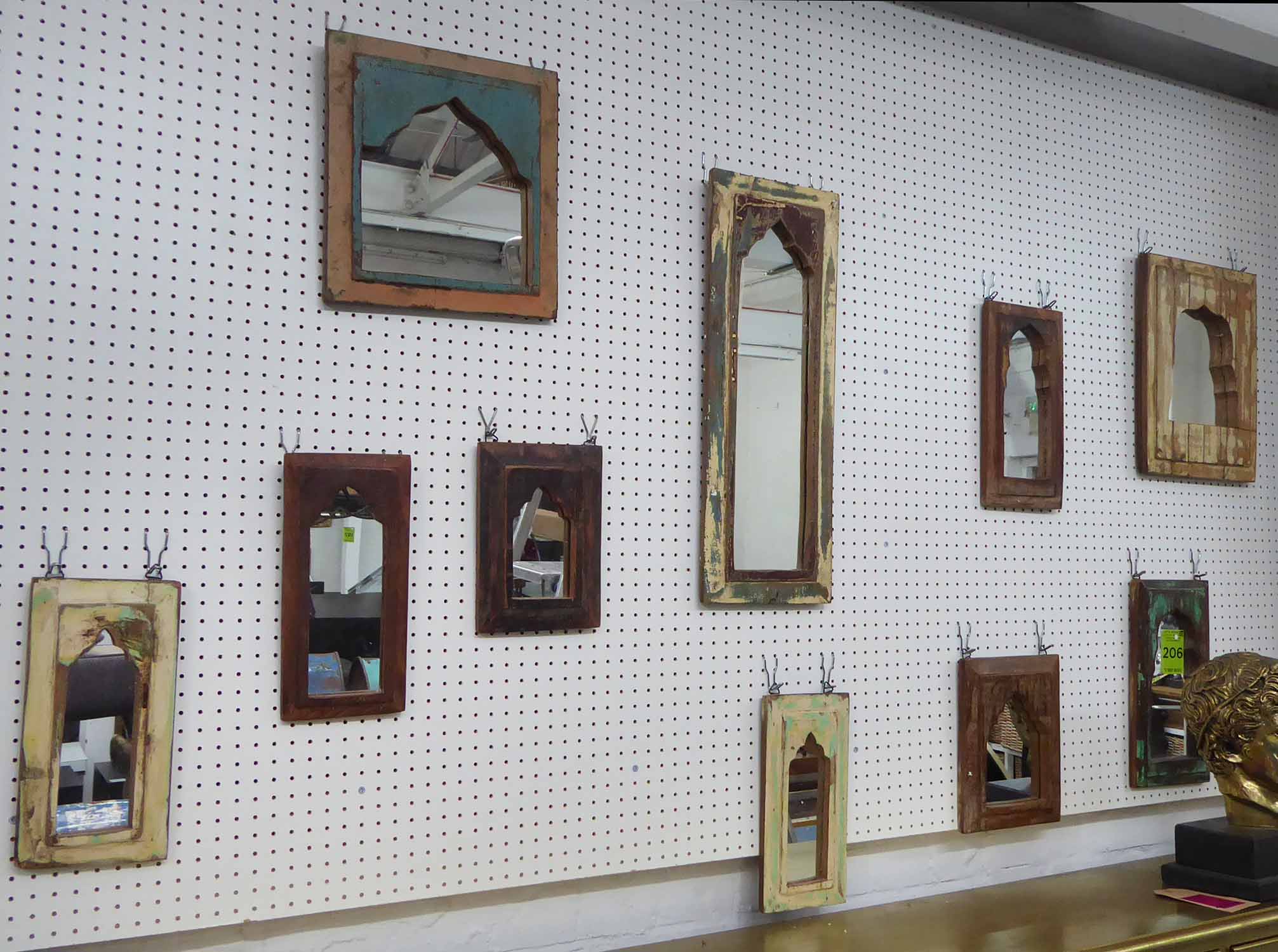 WALL MIRRORS, a set of ten, vintage Indian style, of various sizes and colours,