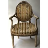 ARMCHAIR, 19th century George III style, cream painted and parcel gilt, with fluted supports,